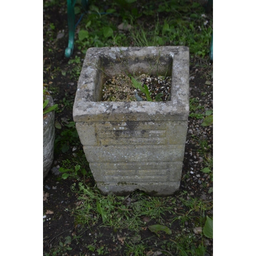 975 - A COMPOSITE CIRCULAR BARREL EFFECT PLANTER containing an aloe yukker plant, and a square planter (2)