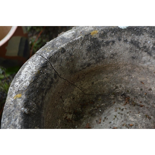 985 - A WEATHERED COMPOSITE GARDEN URN, on a separate plinth, diameter 50cm x height 80cm x height of base... 