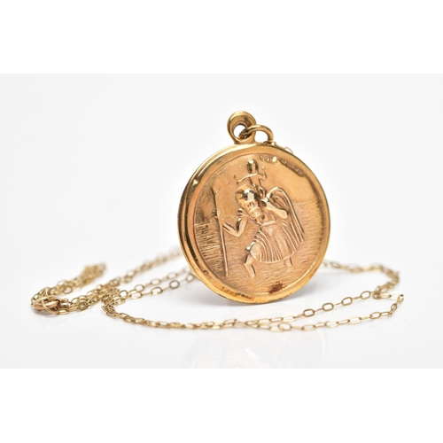 103 - A 9CT GOLD HOLLOW ST CHRISTOPHER PENDANT NECKLACE, the pendant of a circular form, hallmarked 9ct go... 