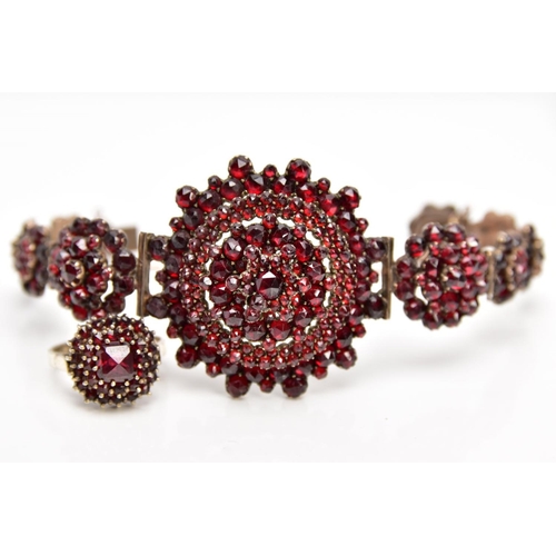 110 - A VICTORIAN GARNET CLUSTER BRACELET AND A GARNET CLUSTER RING, the gold plated bracelet designed wit... 