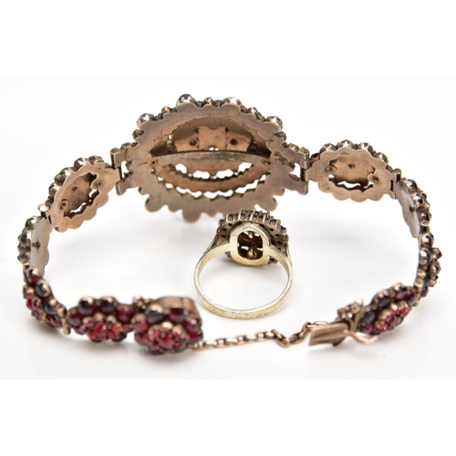 110 - A VICTORIAN GARNET CLUSTER BRACELET AND A GARNET CLUSTER RING, the gold plated bracelet designed wit... 