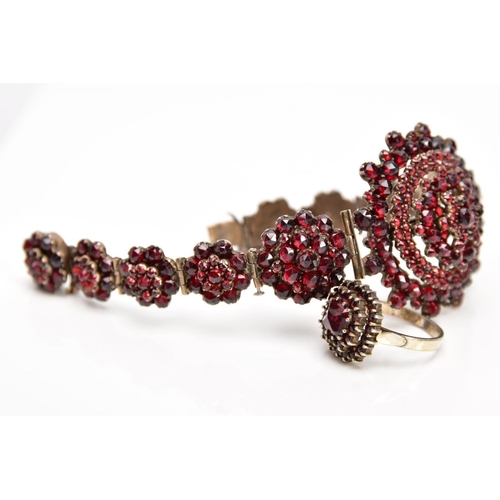 110 - A VICTORIAN GARNET CLUSTER BRACELET AND A GARNET CLUSTER RING, the gold plated bracelet designed wit... 