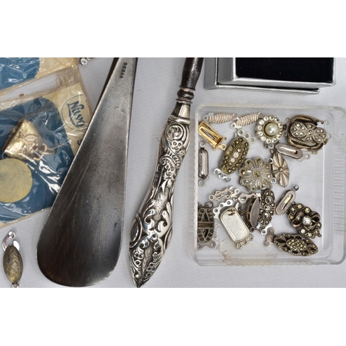 111 - A SELECTION OF SILVER AND WHITE METAL ITEMS, to include four 'Nuvo' sterling silver charms in origin... 