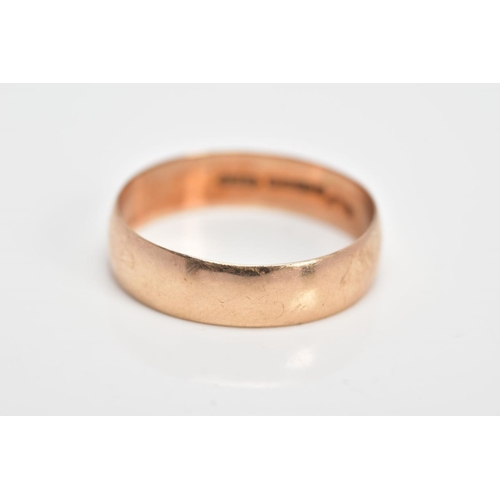 117 - A 9CT GOLD WIDE BAND RING, of a plain polished design, approximate width 5.5mm, hallmarked 9ct gold ... 