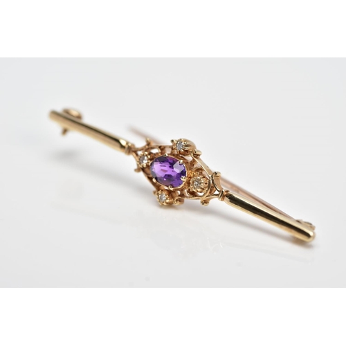 120 - A LATE 20TH CENTURY 9CT GOLD AMETHYST AND DIAMOND BROOCH, designed with a claw set, oval cut amethys... 