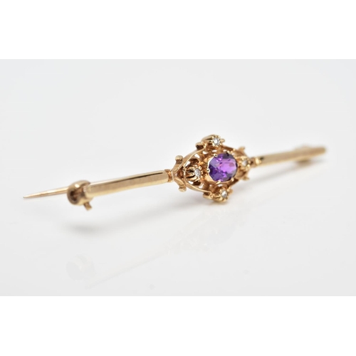 120 - A LATE 20TH CENTURY 9CT GOLD AMETHYST AND DIAMOND BROOCH, designed with a claw set, oval cut amethys... 