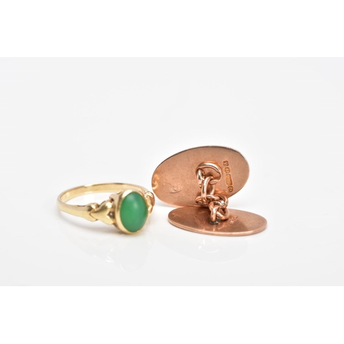 123 - A SINGLE 9CT ROSE GOLD CUFFLINK AND A YELLOW METAL RING, the cufflink of an oval form, reeded rim wi... 