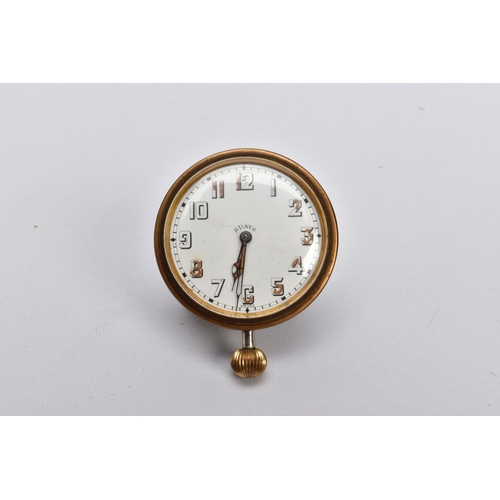 128 - AN EIGHT DAY CAR CLOCK, white enamelled dial, worn bold Arabic numerals, brass surround, hand wound ... 