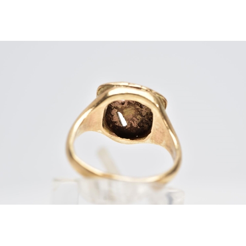 131 - A GENTS 9CT GOLD RING, designed  with an openwork 'Good Year' emblem, plain polished band, hallmarke... 