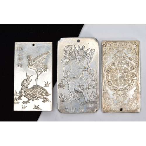 138 - THREE WHITE METAL ORIENTAL PLAQUE PENDANTS, each tested as zinc, each depicting different scenes to ... 