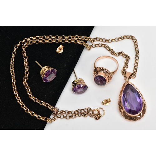 17 - A SYNTHETIC COLOUR CHANGE CORUNDUM SUITE OF JEWELLERY, to include a large pear shape pendant, pear s... 