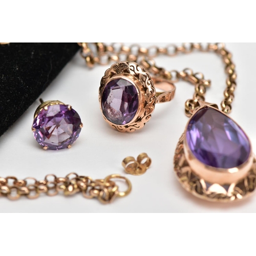 17 - A SYNTHETIC COLOUR CHANGE CORUNDUM SUITE OF JEWELLERY, to include a large pear shape pendant, pear s... 