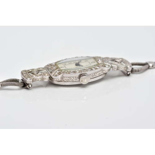 172 - AN EARLY 20TH CENTURY DIAMOND COCKTAIL WATCH, tonneau shape case diamond set with single cut diamond... 