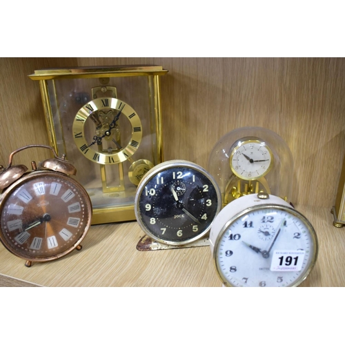 191 - NINETEEN MANTLE AND BEDSIDE CLOCKS, to include four plastic domed rotating pendulum clocks, such as ... 