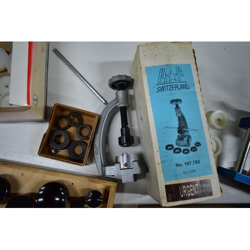 194 - A SELECTION OF WATCH AND CLOCK TOOLS, to include a boxed 'Anchor Glass Fitting Machine' with twenty ... 