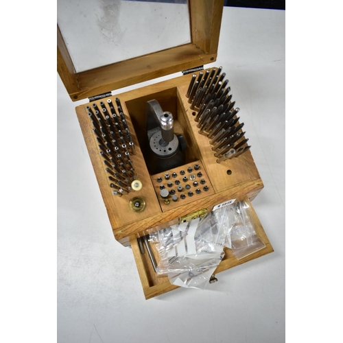 195 - AN 'MKS' STAKING TOOL SET, in a wooden case with a plastic window to the cover, appears almost compl... 