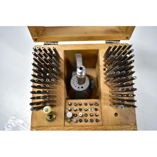 195 - AN 'MKS' STAKING TOOL SET, in a wooden case with a plastic window to the cover, appears almost compl... 