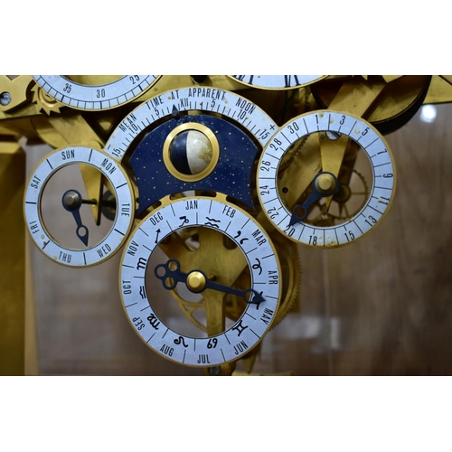 204 - A MID 20TH CENTURY GILT METAL SKELETON TABLE CLOCK, with seven dials for hours, minutes, seconds, da... 