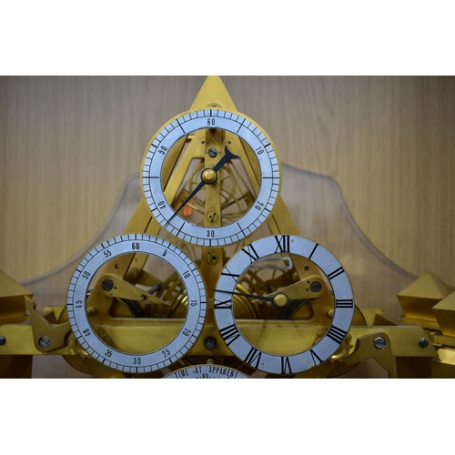 204 - A MID 20TH CENTURY GILT METAL SKELETON TABLE CLOCK, with seven dials for hours, minutes, seconds, da... 