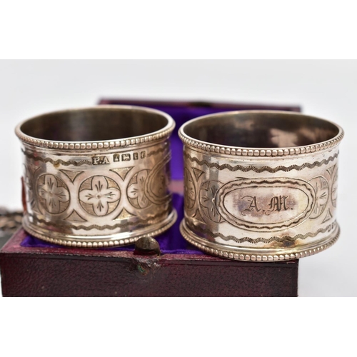 207 - A BOXED PAIR OF LATE VICTORIAN SILVER NAPKIN RINGS, A SILVER POCKET WATCH AND KEYS, each of a circul... 