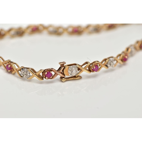 21 - A 9CT GOLD RUBY AND DIAMOND LINE BRACELET, set with circular cut rubies, interspaced with illusion s... 