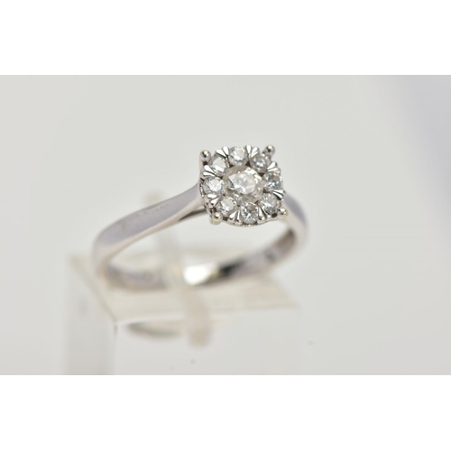 22 - A 9CT WHITE GOLD DIAMOND CLUSTER RING, circular cluster set with nine round brilliant cut diamonds, ... 