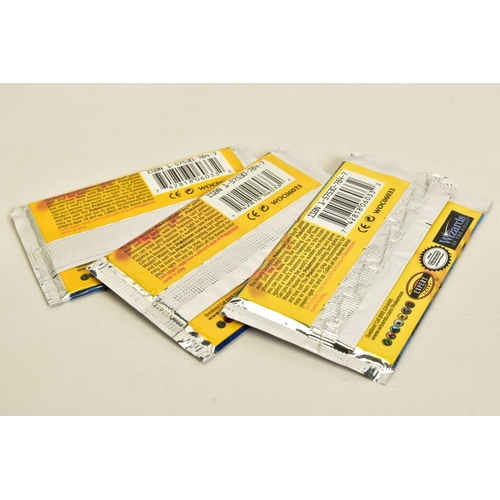 A SEALED POKEMON BASE SET BLACK TRIANGLE ERROR PRINTED BOOSTER PACK, with  two other sealed Base set