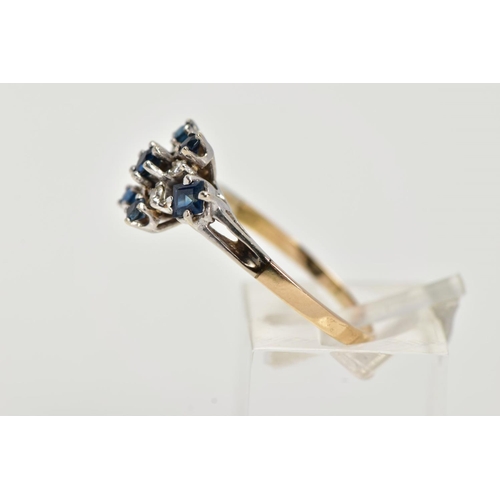 25 - A YELLOW METAL SAPPHIRE AND DIAMOND CLUSTER RING, set with a central claw set, circular cut blue sap... 