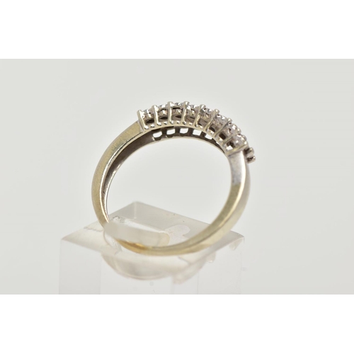 30 - A 9CT WHITE GOLD HALF HOOP DIAMOND RING, designed with two rows of illusion set, single cut diamonds... 