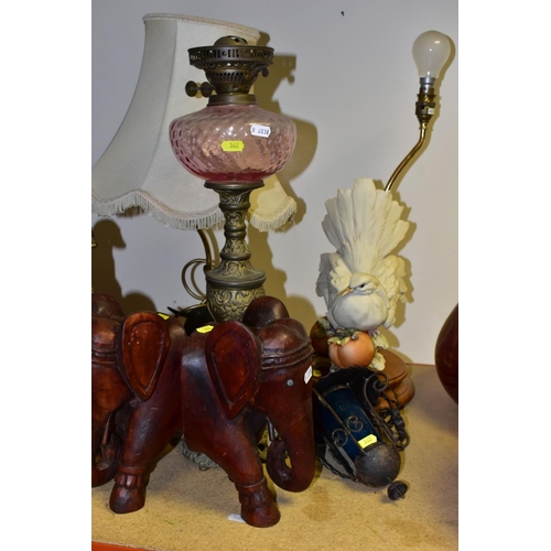 362 - A VICTORIAN CAST IRON MR PUNCH DOORSTOP, later painted decoration, height 31cm, a pair of wooden ele... 