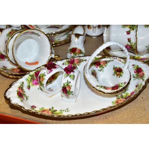 369 - A ROYAL ALBERT OLD COUNTRY ROSES PART DINNER SERVICE AND ORNAMENTAL WARES, comprising ten dinner pla... 