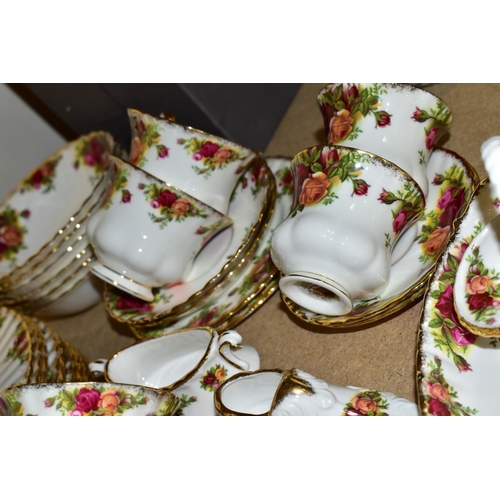 369 - A ROYAL ALBERT OLD COUNTRY ROSES PART DINNER SERVICE AND ORNAMENTAL WARES, comprising ten dinner pla... 