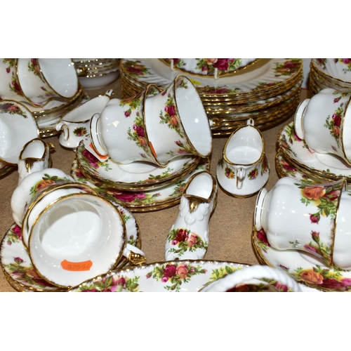 369 - A ROYAL ALBERT OLD COUNTRY ROSES PART DINNER SERVICE AND ORNAMENTAL WARES, comprising ten dinner pla... 