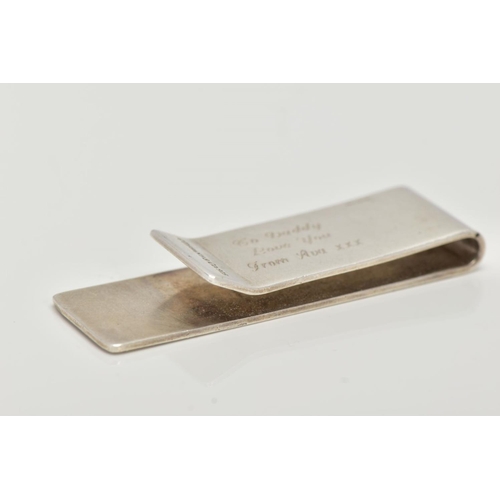 40 - A 'TIFFANY & CO' SILVER MONEY CLIP, engraved T & Co 1837, also engraved to the reverse 'To Daddy lov... 