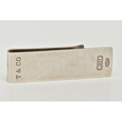 40 - A 'TIFFANY & CO' SILVER MONEY CLIP, engraved T & Co 1837, also engraved to the reverse 'To Daddy lov... 