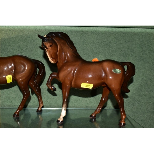 400 - SEVEN BESWICK BROWN HORSES/FOAL, comprising Bois Roussel Racehorse No 701, 2nd version (leg loose an... 