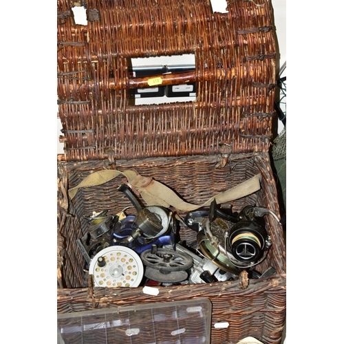 418 - A QUANTITY OF FISHING EQUIPMENT, including line, floats, flies, folding stool, a wicker fishing bask... 