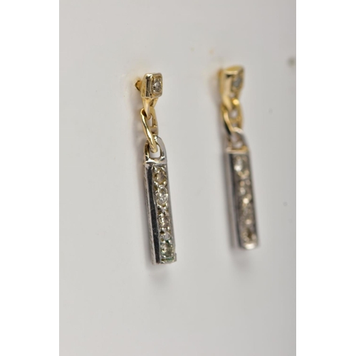 42 - A PAIR OF GOLD PLATED DIAMOND DROP EARRINGS, each earring suspending a bar drop set with single cut ... 