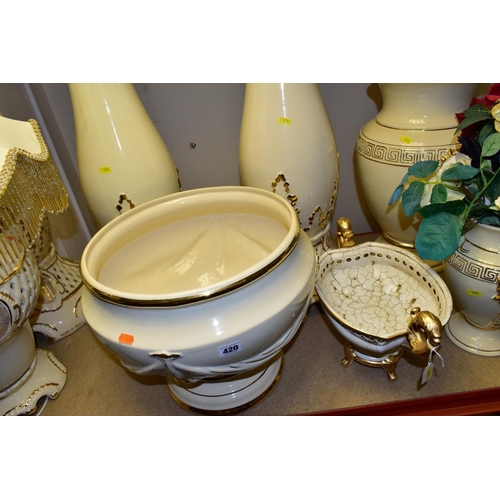 420 - A QUANTITY OF MODERN ITALIAN CREAM AND GILT POTTERY JARDINIERE STANDS, JARDINIERES, etc, top include... 