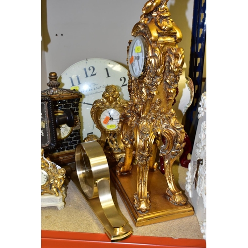 421 - ELEVEN VARIOUS CLOCKS, all with quartz movements, including two wall clocks, a Churchill mantel cloc... 