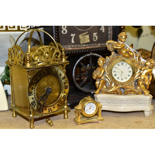 421 - ELEVEN VARIOUS CLOCKS, all with quartz movements, including two wall clocks, a Churchill mantel cloc... 