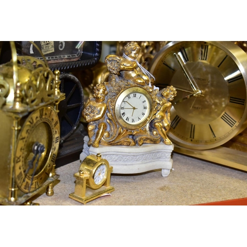 421 - ELEVEN VARIOUS CLOCKS, all with quartz movements, including two wall clocks, a Churchill mantel cloc... 