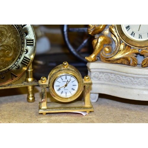 421 - ELEVEN VARIOUS CLOCKS, all with quartz movements, including two wall clocks, a Churchill mantel cloc... 