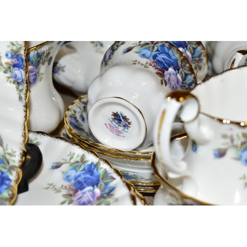 422 - A ROYAL ALBERT 'MOONLIGHT ROSE' PATTERN DINNER AND TEA SERVICE WITH MATCHING ORNAMENTAL ITEMS, etc, ... 