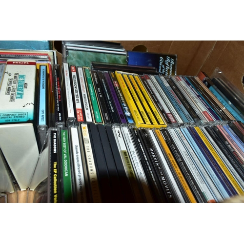 438 - THREE BOXES OF CD'S AND SINGLES, including boxed sets of Hits of the 60's, Blues Legends, Mozart, ot... 