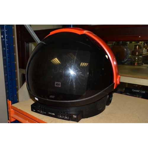 450 - A PHILIPS DISCOVERER TV SHAPED AS SPACE HELMET, in red and black with sliding visor over the screen,... 