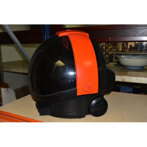 450 - A PHILIPS DISCOVERER TV SHAPED AS SPACE HELMET, in red and black with sliding visor over the screen,... 