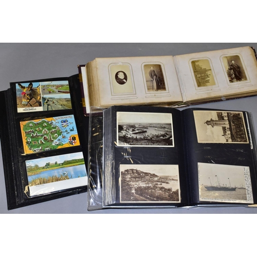 461 - POSTCARDS AND PHOTOGRAPHS, two albums containing approximately three hundred postcards and greetings... 