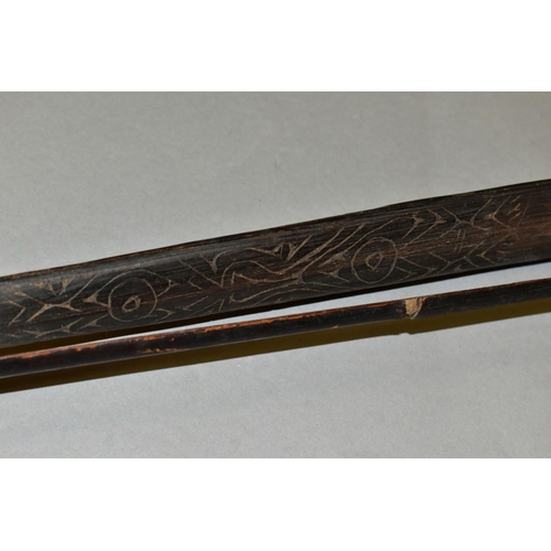 473 - TRIBAL INTEREST, a Trobian Islands bow, with carved decoration to one end, length 180cm, together wi... 