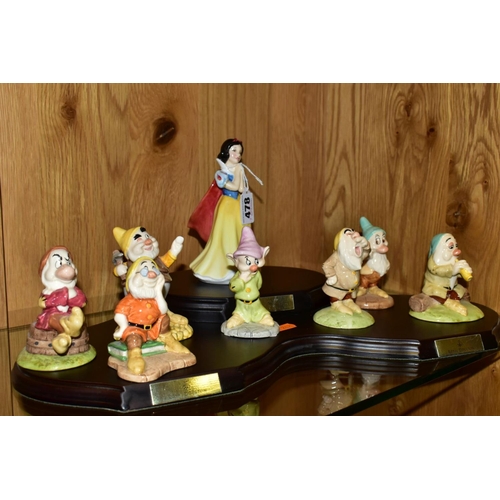 478 - ROYAL DOULTON WALT DISNEY SNOW WHITE AND THE SEVEN DWARFS FIGURES, 'Snow White' SW9, 'Doc' SW010, Gr... 